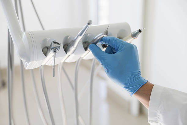 Professional Tooth Extraction technician working in Great Falls, VA